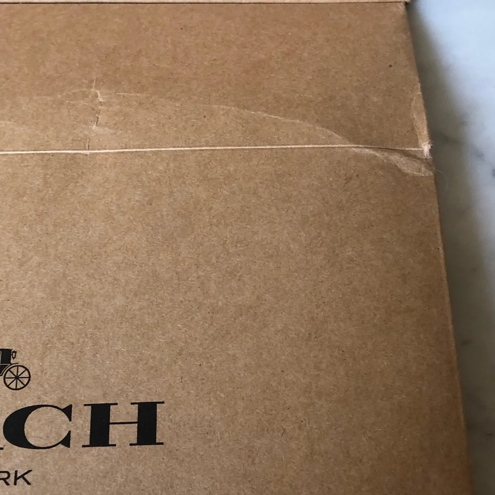 Coach gift boxes. Two gift boxes. They fold flat for easy storage.
